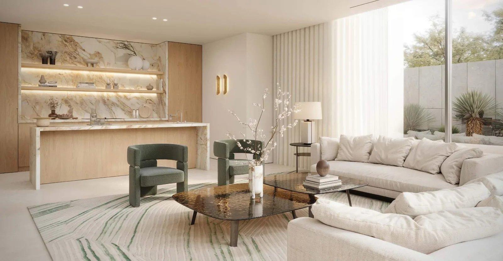 Living room and open kitchen inside an Eden House Dubai Hills villa